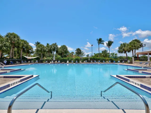 a view of a swimming pool and outdoor space