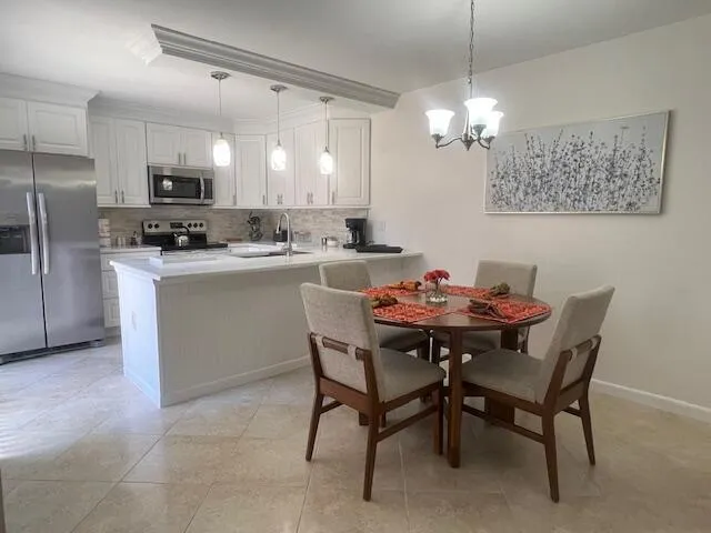 a view of a dining room with furniture