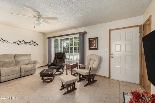 a living room with furniture and a window