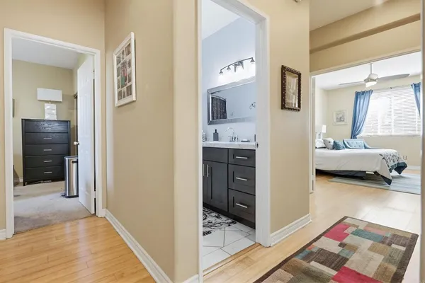 a view of a bedroom and bathroom