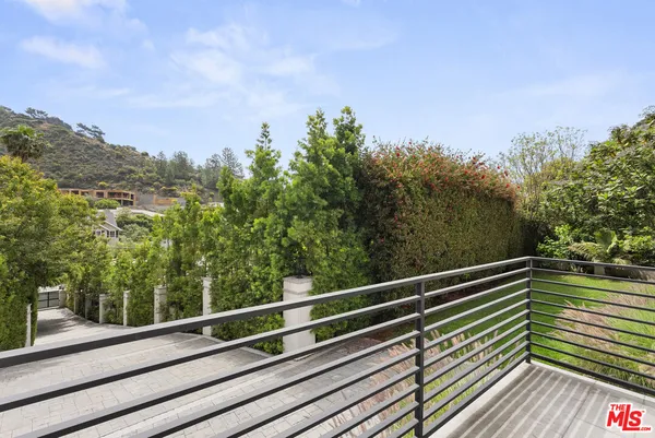 a view of balcony with mountain view
