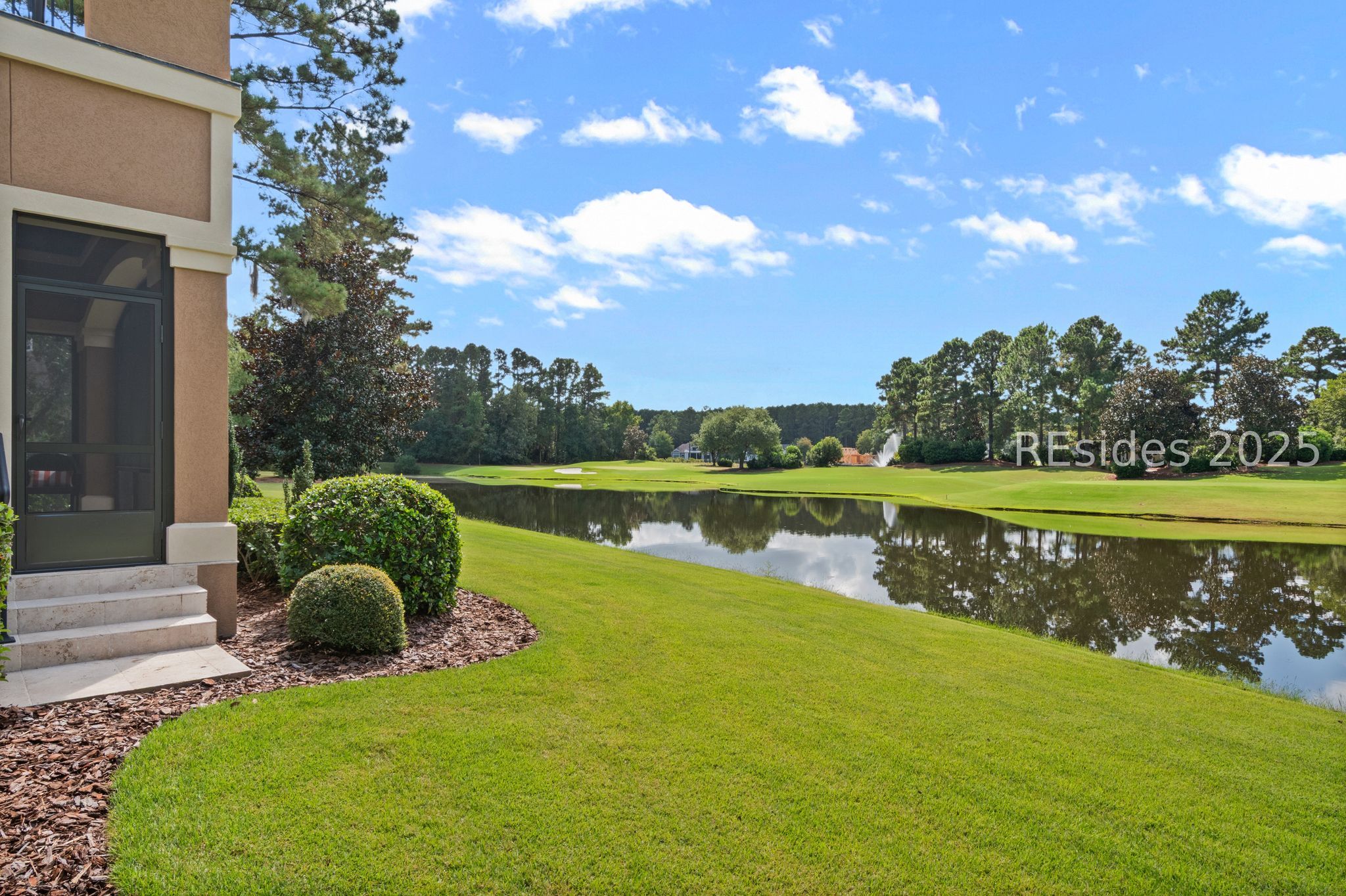1037 Berkeley Hall Boulevard Bluffton, SC 29909 - Photo 41 of 47 Long view of lagoon & golf course from home