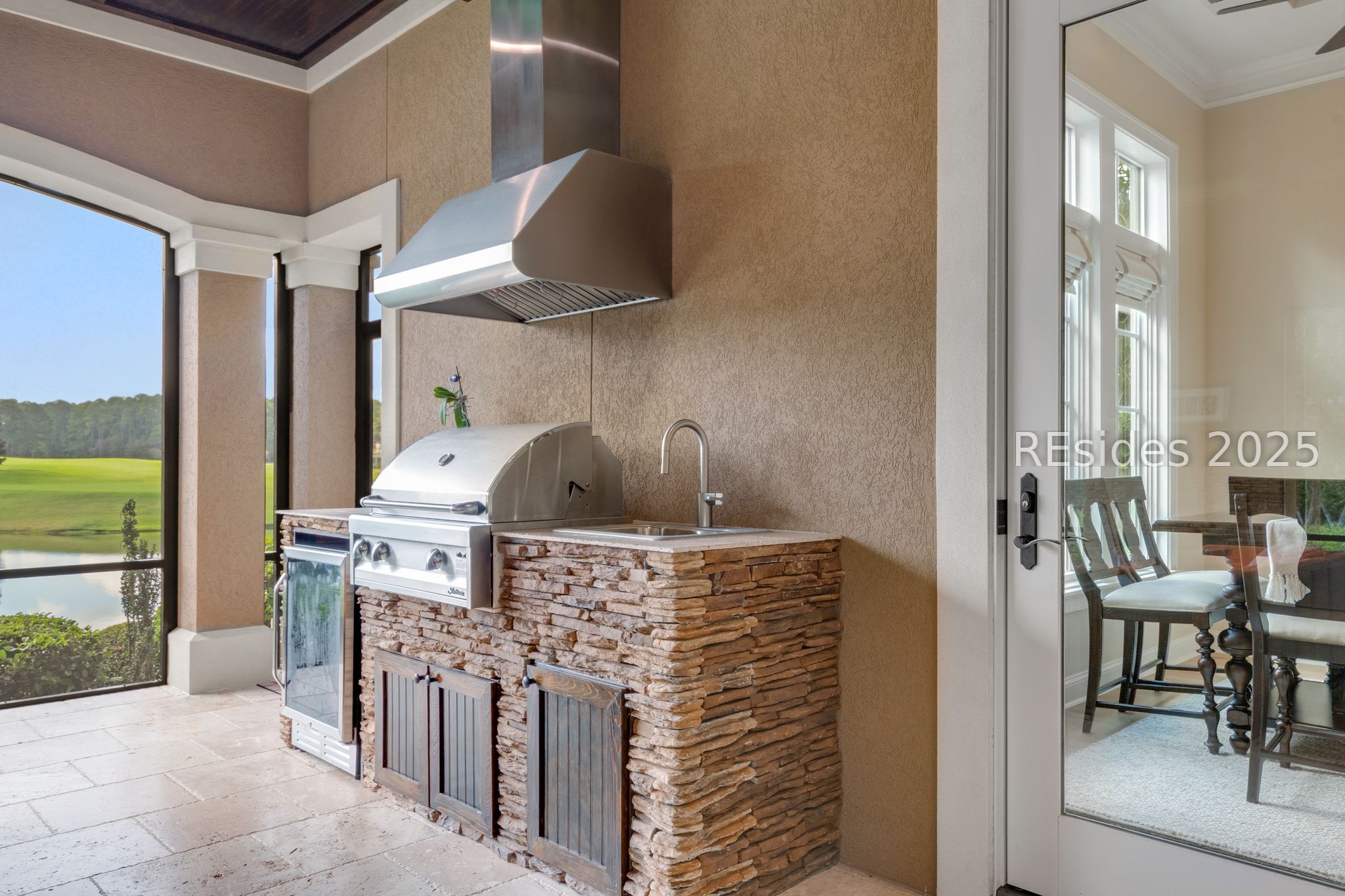 1037 Berkeley Hall Boulevard Bluffton, SC 29909 - Photo 10 of 47 Outdoor kitchen area on screened porch