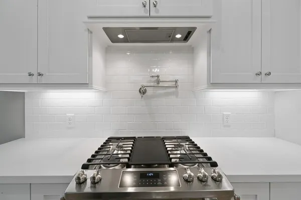 a close up of a stove in a kitchen