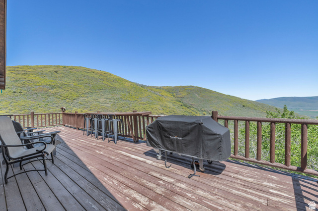 2348 North Miles Holw Road, Unit 26 Kamas, UT 84036 - Photo 22 of 31 Wooden deck featuring a mountain view and a grill