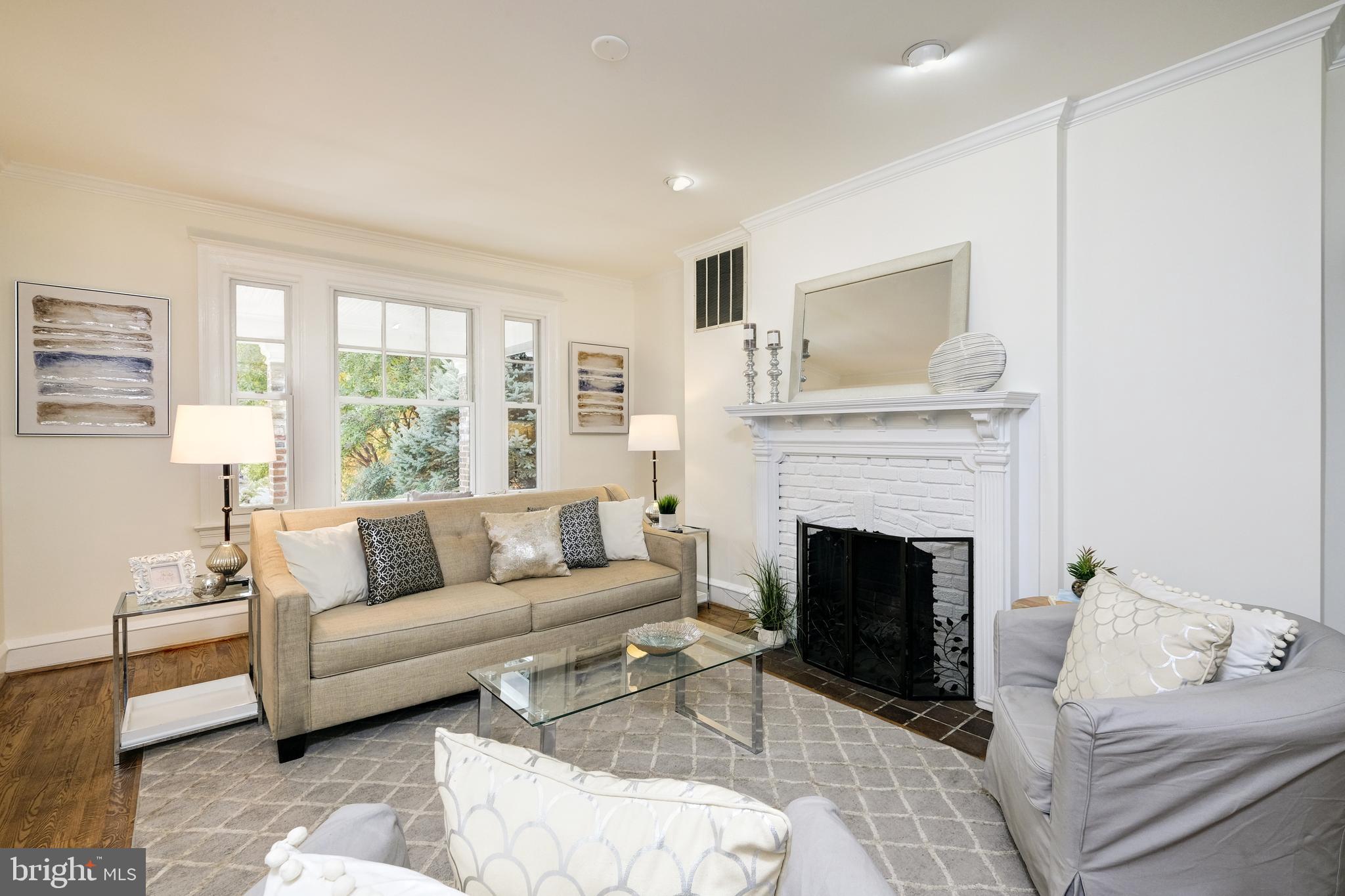 2009 Klingle Road Northwest Washington, DC 20010 - Photo 5 of 20 Lovely living room with wood-burning fireplace