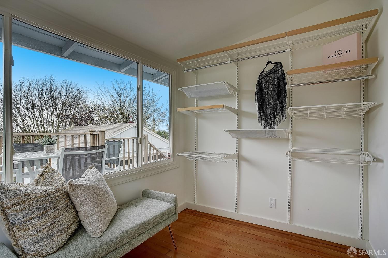 3014 Morcom Avenue Oakland, CA 94619 - Photo 23 of 36 a living room with furniture and a large window