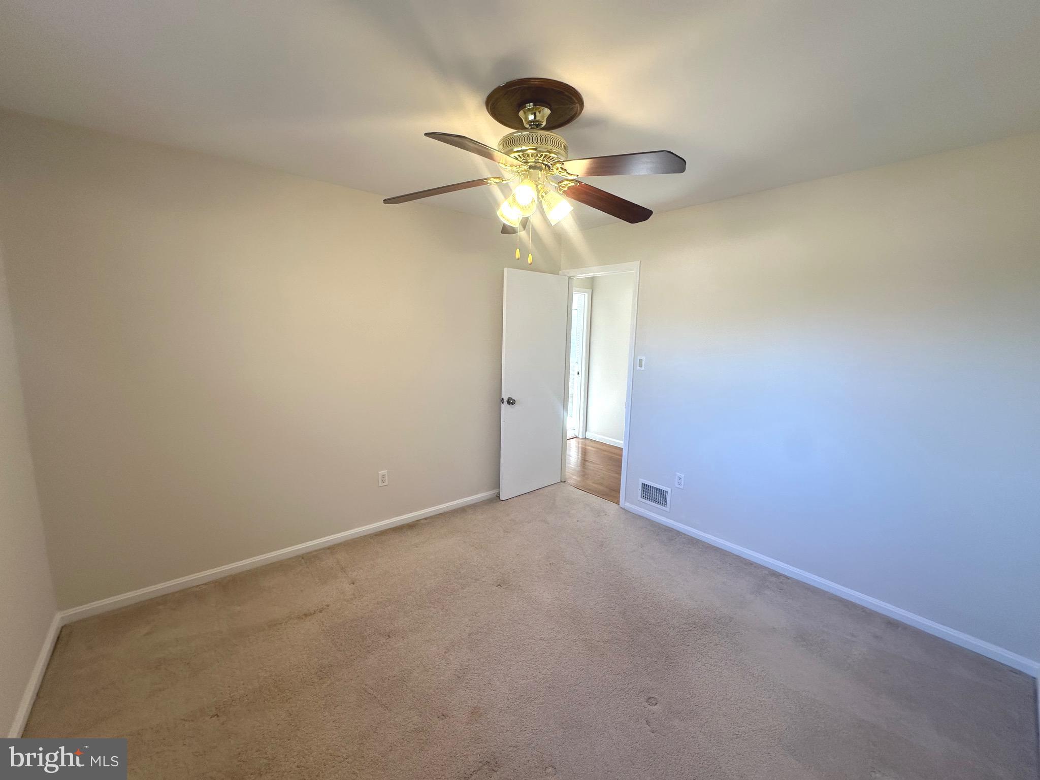 8601 Kenilworth Drive Springfield, VA 22151 - Photo 26 of 47 a view of a chandelier fan and a chandelier fan