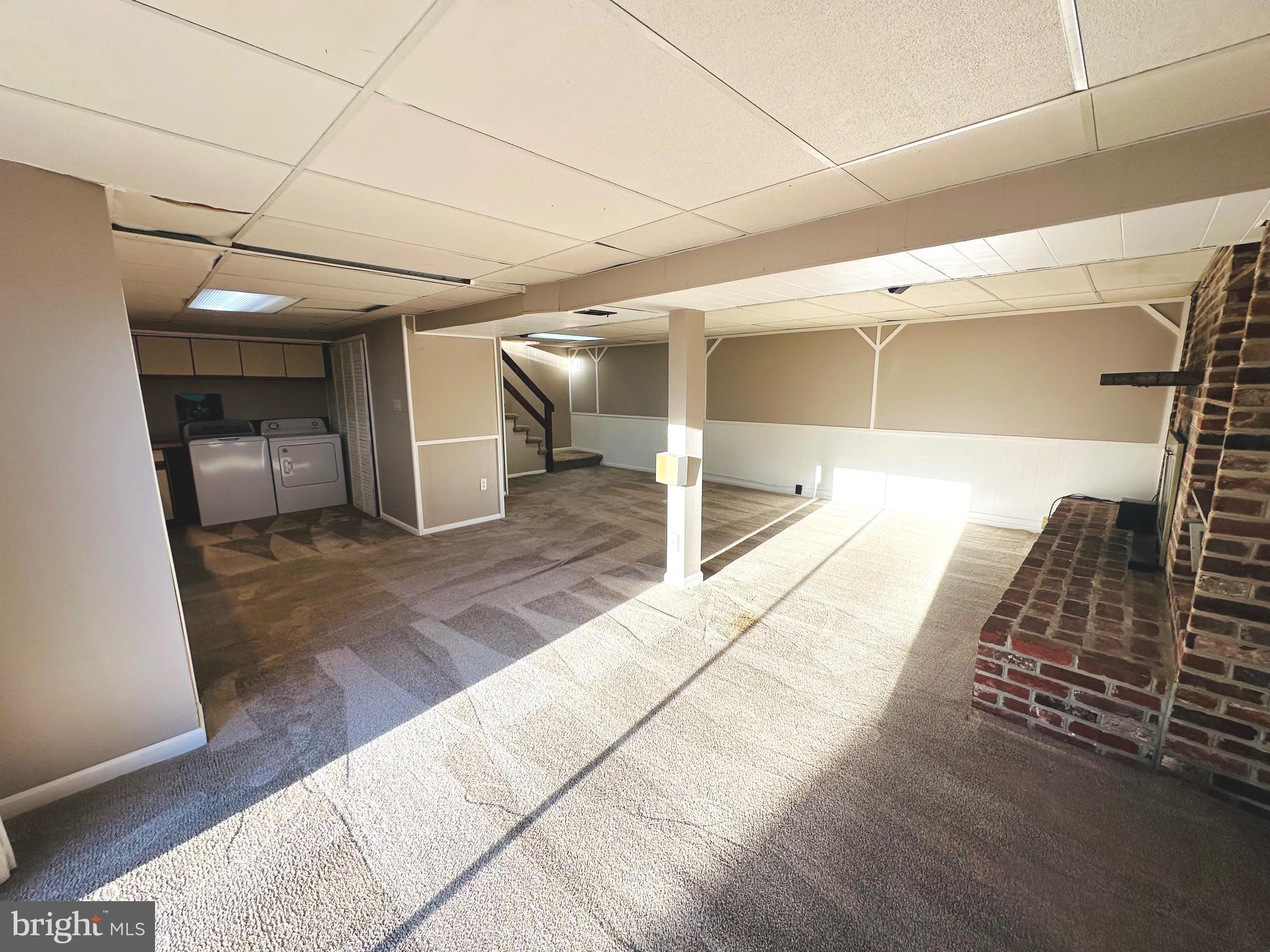 8601 Kenilworth Drive Springfield, VA 22151 - Photo 35 of 47 a view of a hallway with wooden floor and furniture