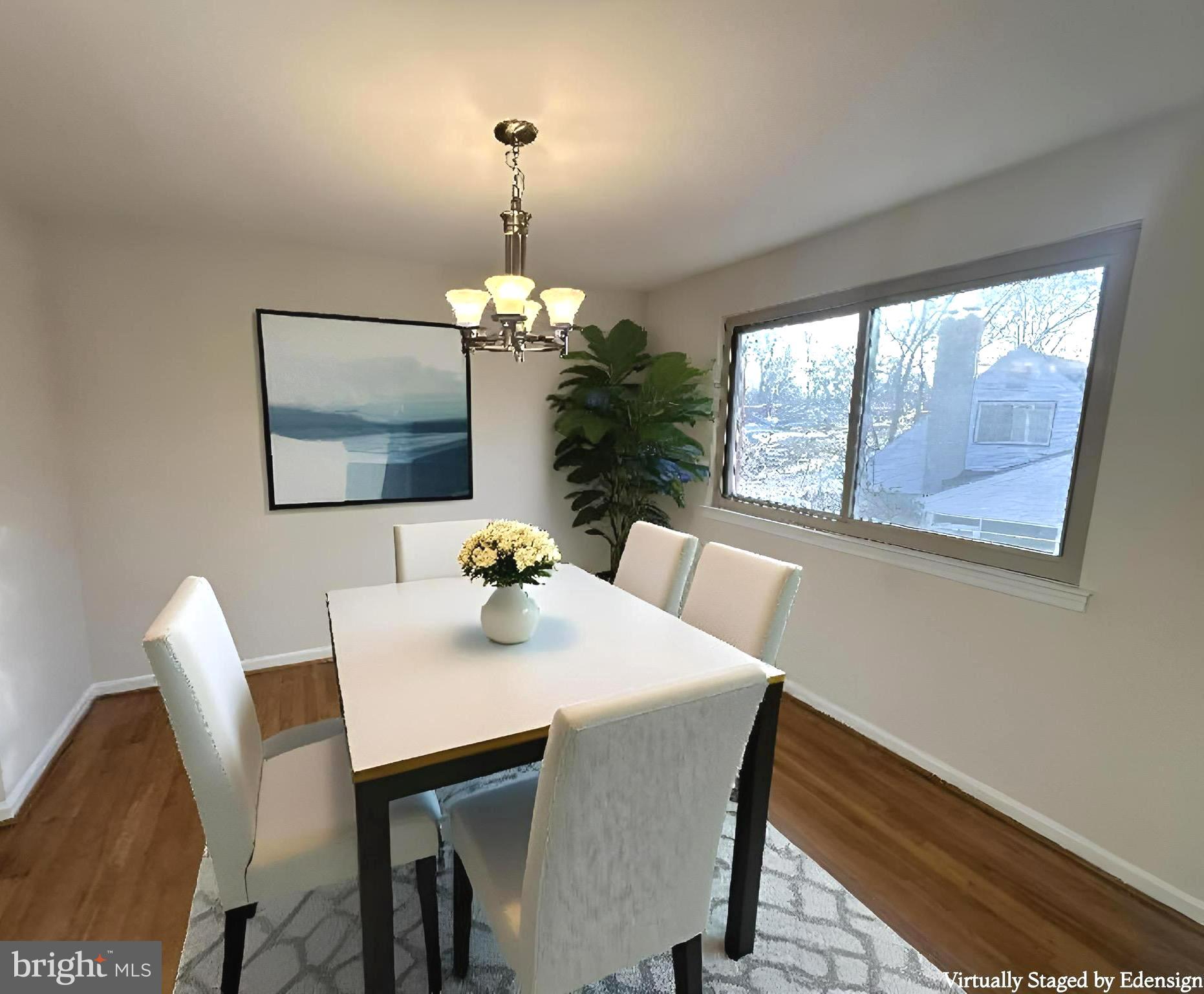 8601 Kenilworth Drive Springfield, VA 22151 - Photo 7 of 47 a view of a dining room with a table and chairs