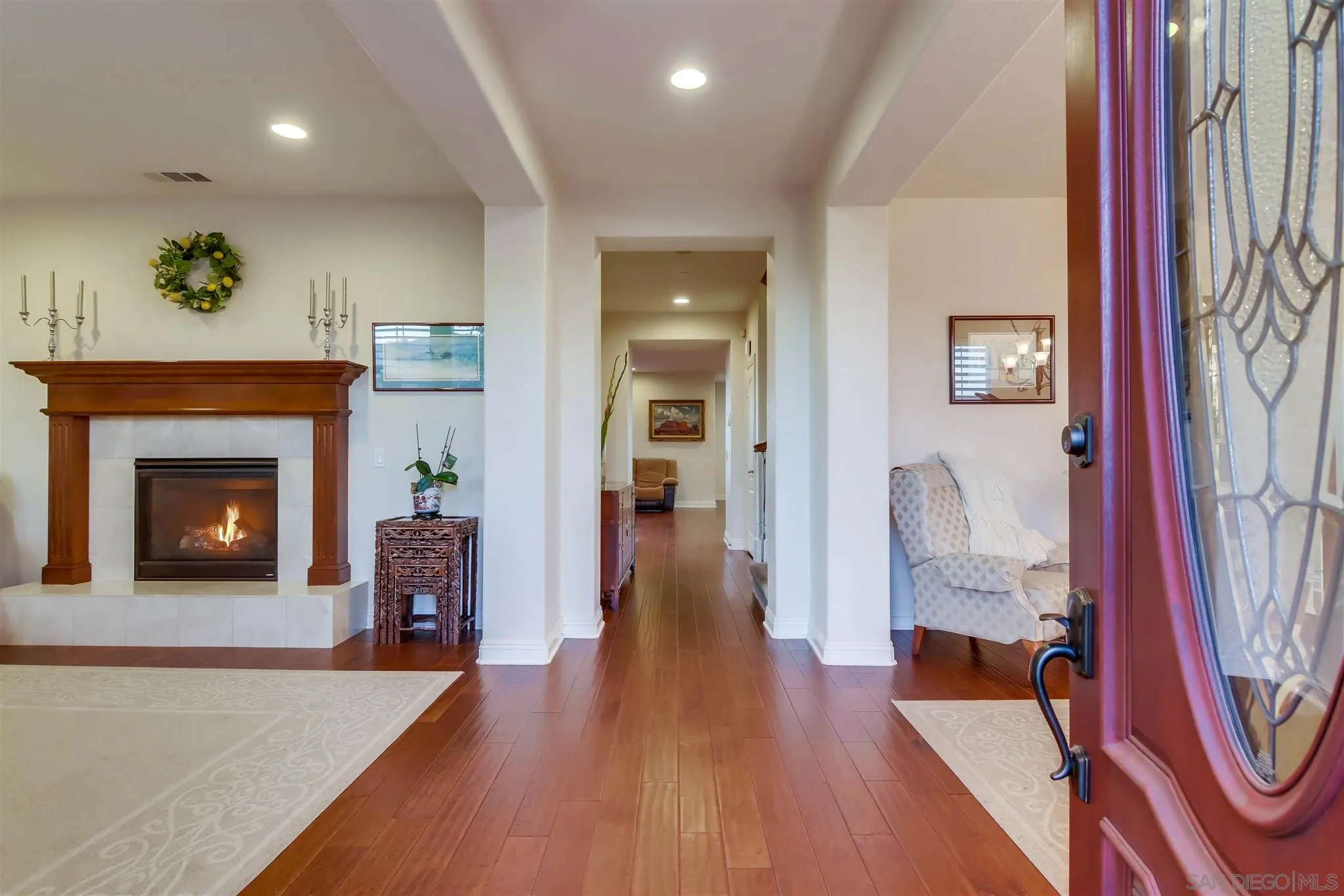 7267 Ocotillo Street Santee, CA 92071 - Photo 8 of 53 a living room with furniture and a fireplace