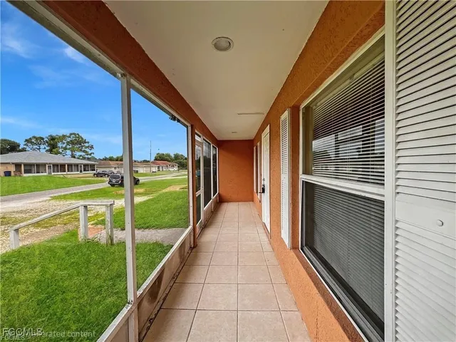 a view of a backyard of the house