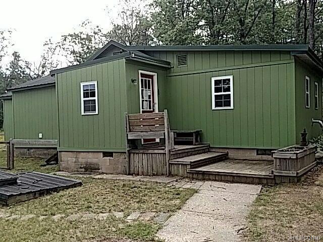 108 Forest Mead Road Harrison, MI 48625 - Photo 1 of 16