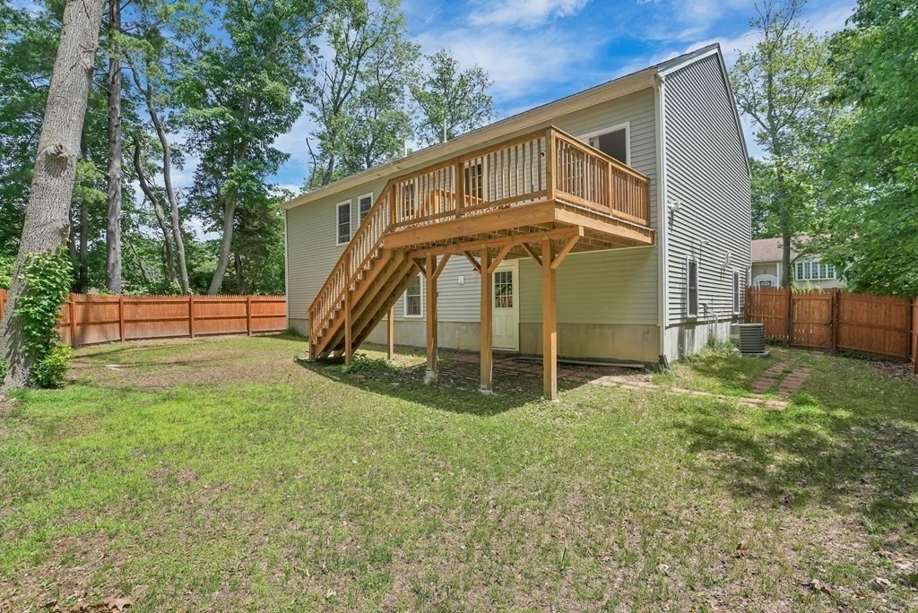 18 Castleton Avenue Randolph, MA 02368 - Photo 23 of 25 a view of a house with backyard