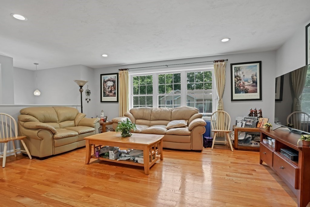 18 Castleton Avenue Randolph, MA 02368 - Photo 3 of 25 a living room with furniture and a flat screen tv