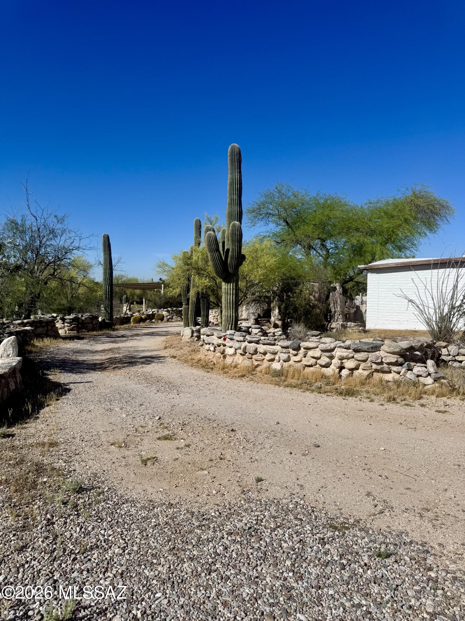 4415 North Swan Road Tucson, AZ 85718 - Photo 33 of 33 a street view with couple of cars parked on road