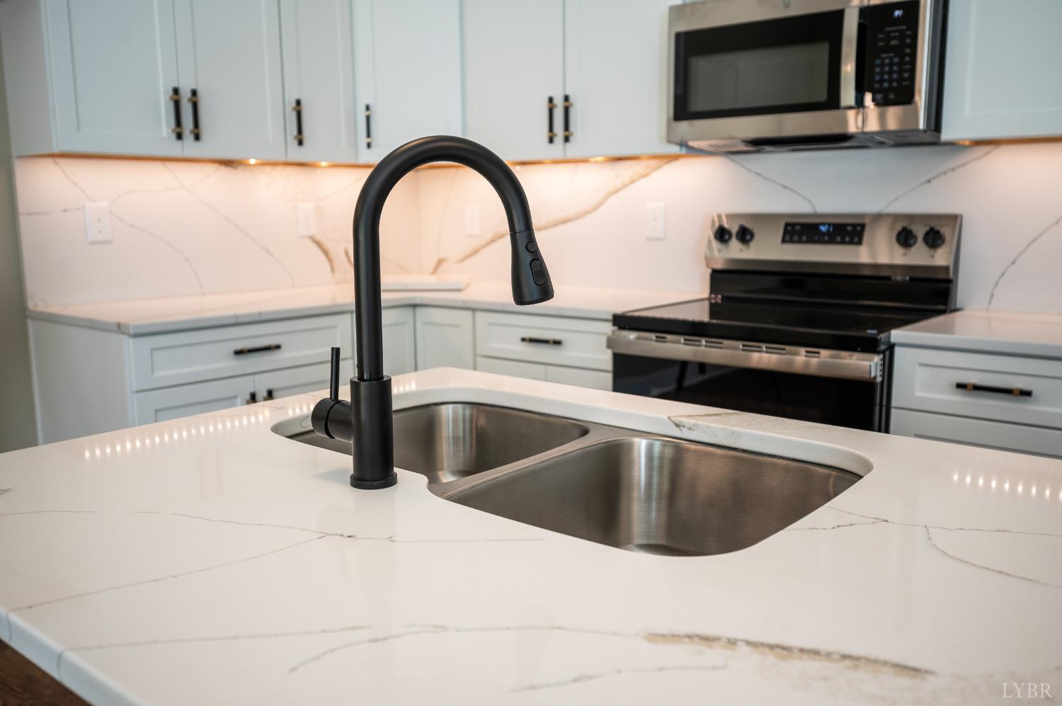 57 Luke Court Rustburg, VA 24588 - Photo 13 of 41 a view of a kitchen with a sink and a stove