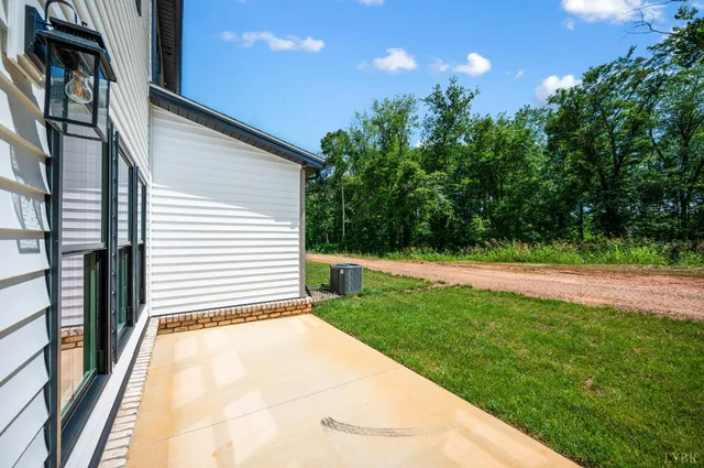 a view of backyard with green space