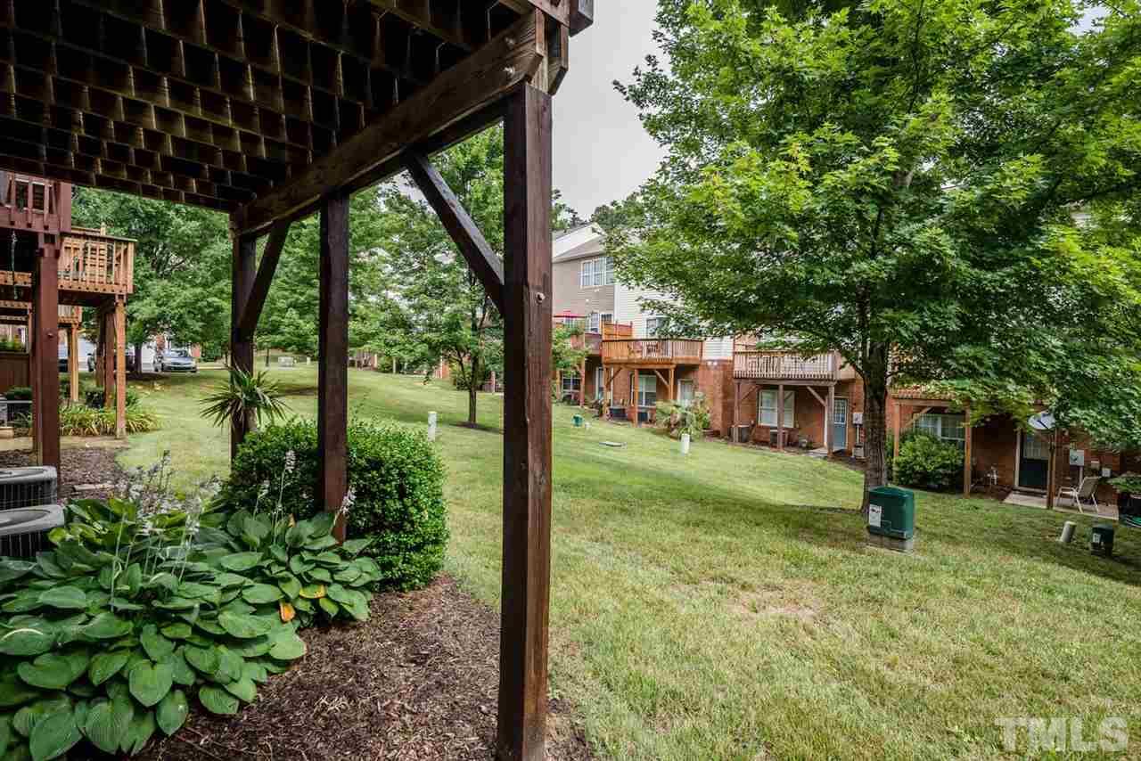 5522 Shady Crest Drive Raleigh, NC 27613 - Photo 21 of 25 a view of a house with a backyard