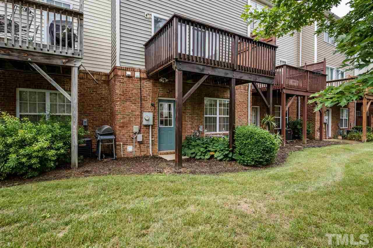 5522 Shady Crest Drive Raleigh, NC 27613 - Photo 22 of 25 a front view of a house with garden
