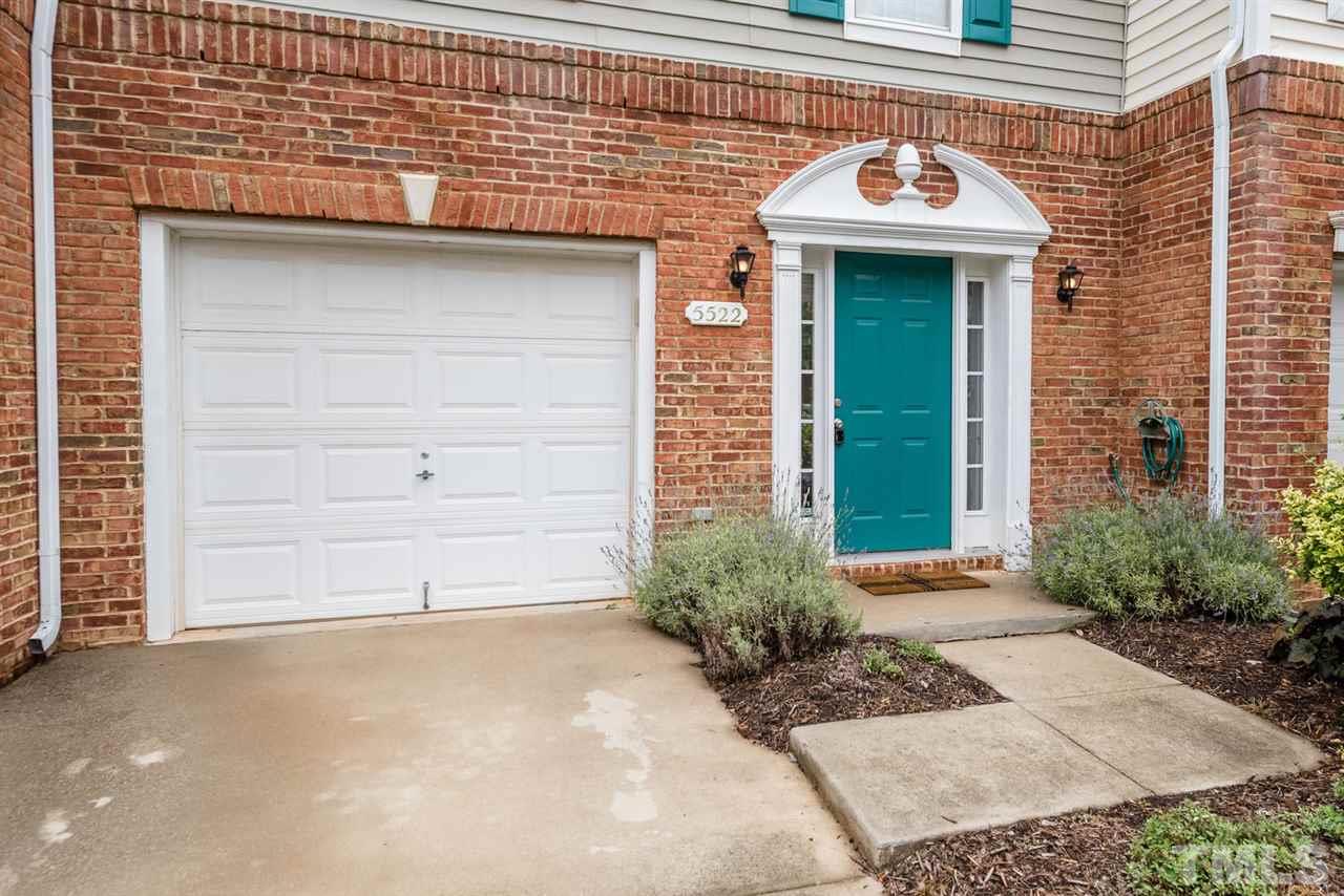 5522 Shady Crest Drive Raleigh, NC 27613 - Photo 4 of 25 a front view of a house with a outdoor space