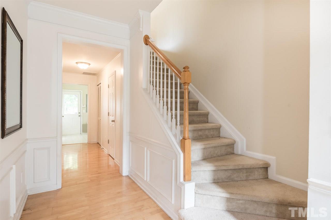 5522 Shady Crest Drive Raleigh, NC 27613 - Photo 6 of 25 a view of entryway and hall with wooden floor