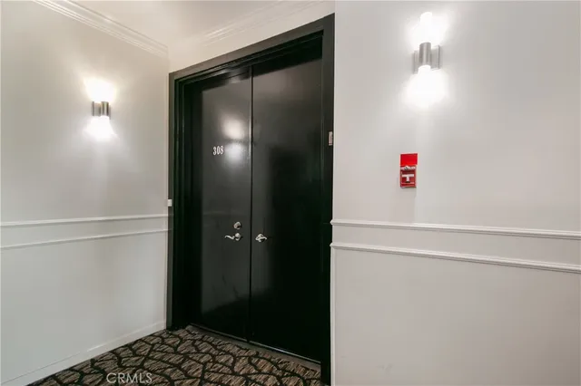 a bathroom with a shower and a sink