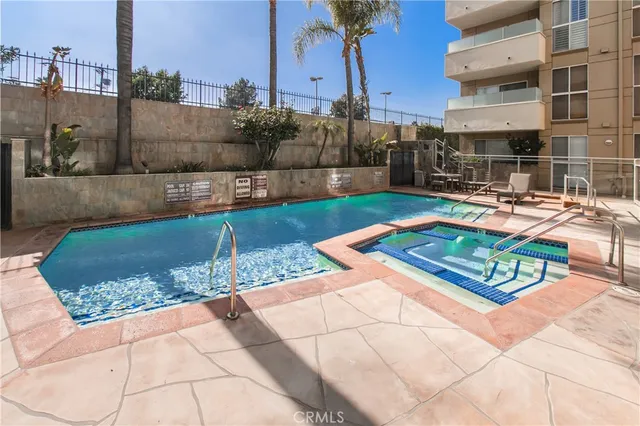 a view of a park with large trees