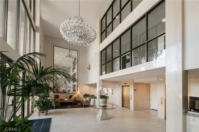 a view of entryway and hall with a large window