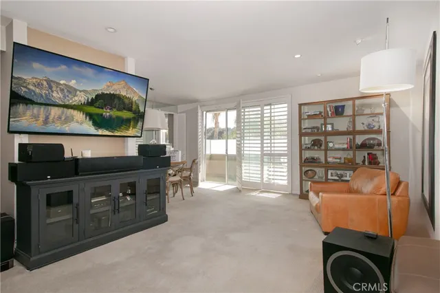 a view of workspace with furniture and window