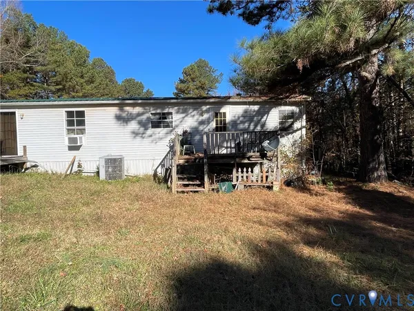 a house with trees in the background