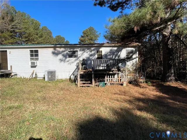 a house with trees in the background