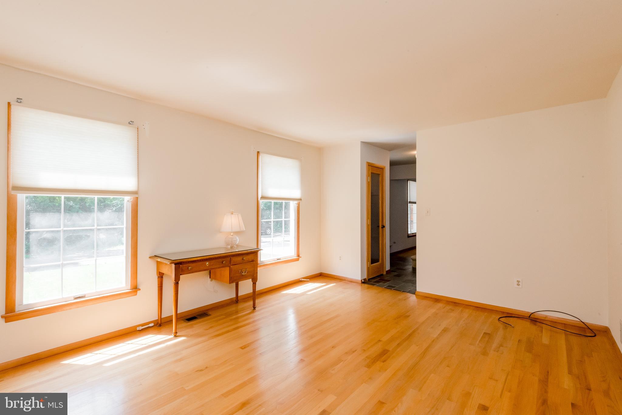 1768 Nanticoke Road Pasadena, MD 21122 - Photo 11 of 39 Living Room -bright and spacious, wood floors