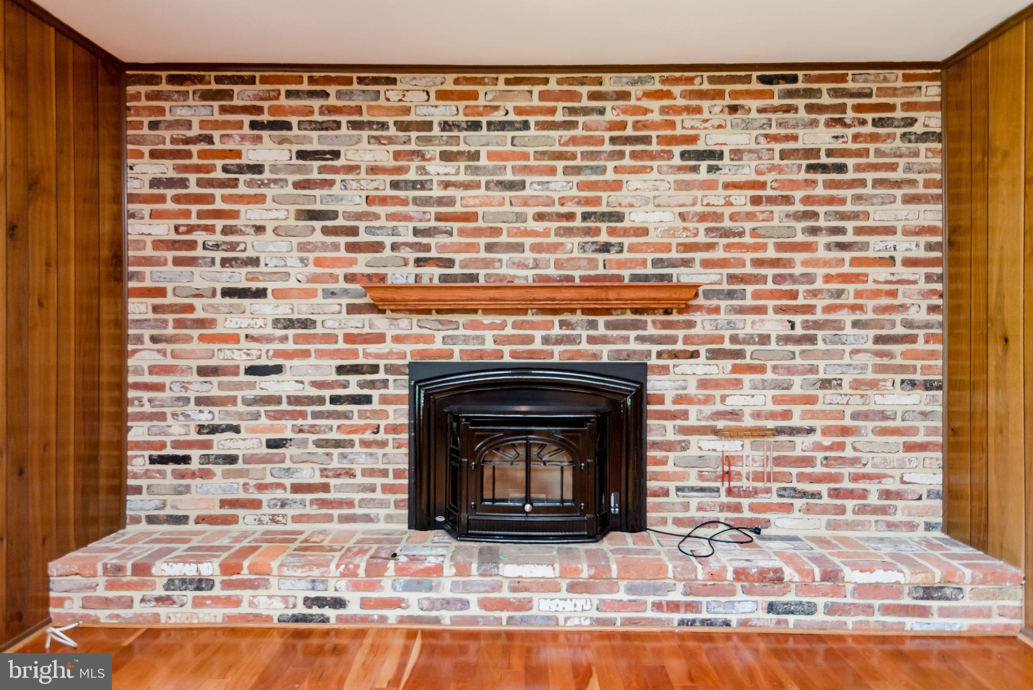 1768 Nanticoke Road Pasadena, MD 21122 - Photo 10 of 39 Pellet stove located in Family Room