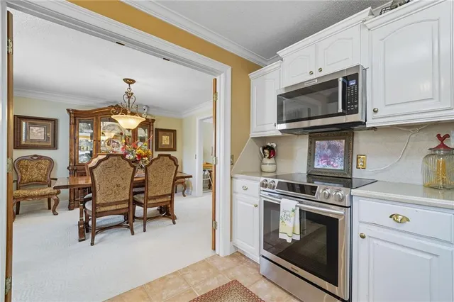 a bedroom with a bed dresser and a window