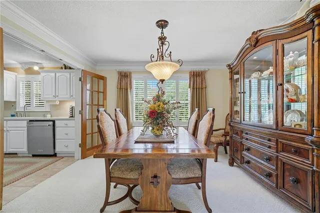 a bathroom with a toilet a sink and a shower
