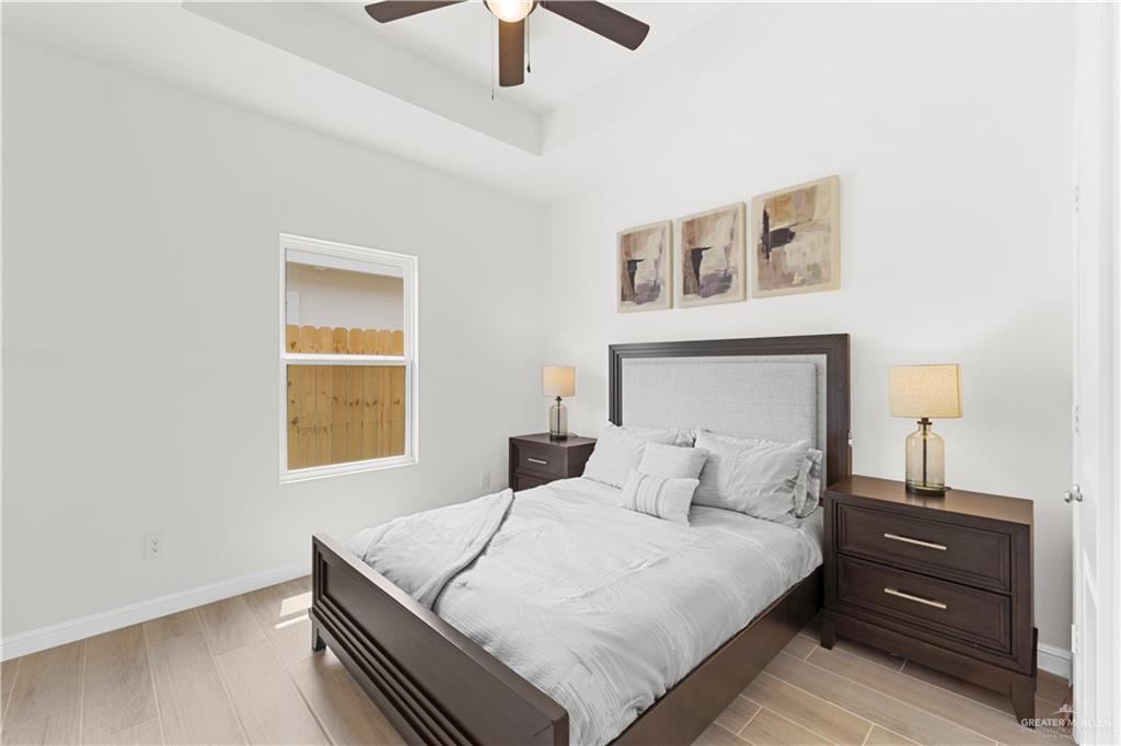 5321 Vision Street Rio Grande City, TX 78582 - Photo 12 of 34 a bedroom with a bed and a window