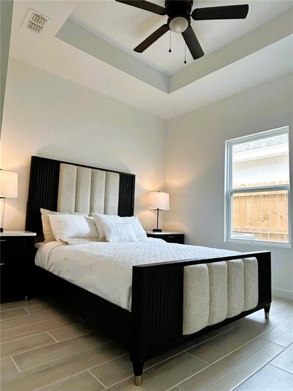 5321 Vision Street Rio Grande City, TX 78582 - Photo 13 of 34 a bedroom with a bed and window