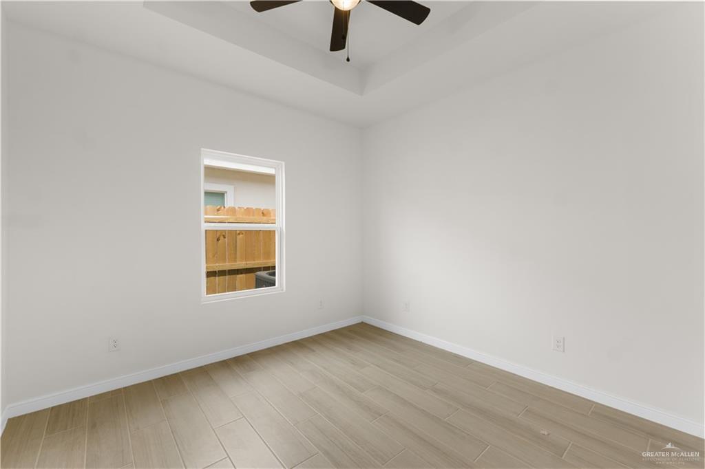5321 Vision Street Rio Grande City, TX 78582 - Photo 20 of 34 an empty room with a window