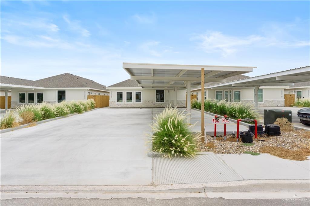 5321 Vision Street Rio Grande City, TX 78582 - Photo 2 of 34 front view of a house with a patio