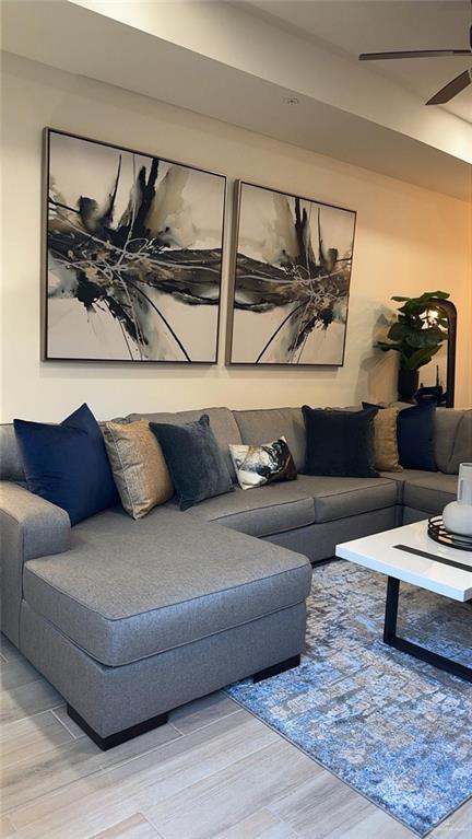 5321 Vision Street Rio Grande City, TX 78582 - Photo 27 of 34 a living room with furniture and painting on the wall