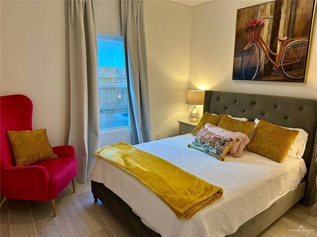 5321 Vision Street Rio Grande City, TX 78582 - Photo 32 of 34 a bedroom with a bed and cupboard