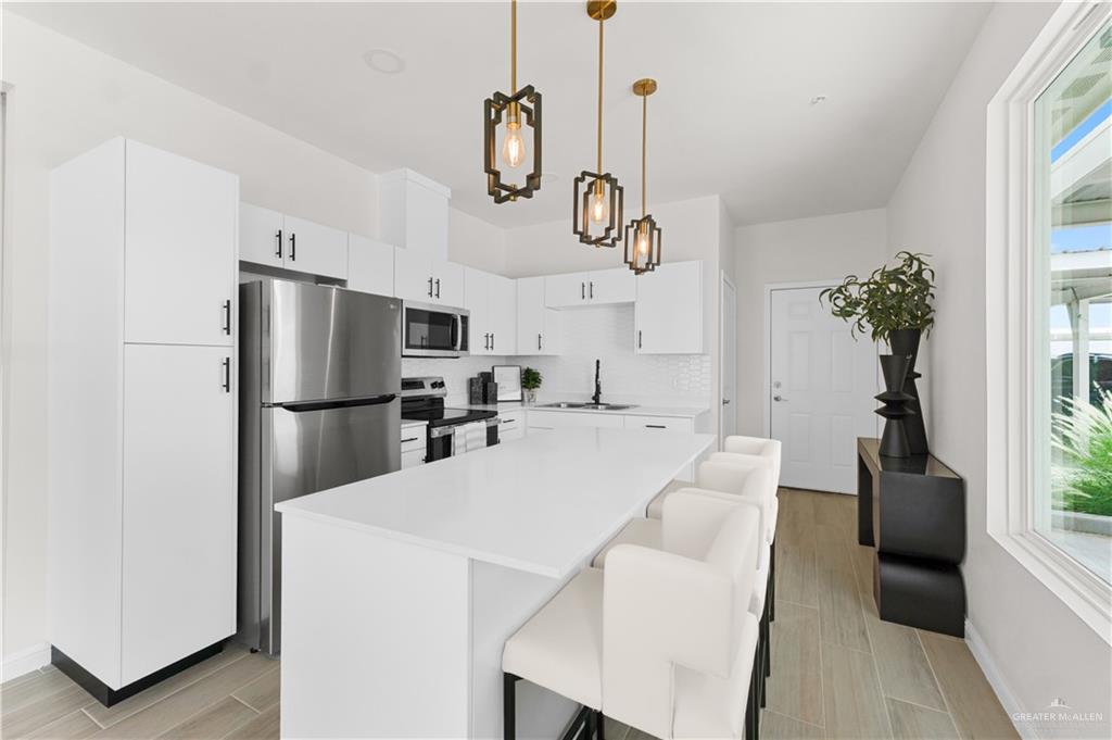 5321 Vision Street Rio Grande City, TX 78582 - Photo 9 of 34 a very nice looking room with a couch