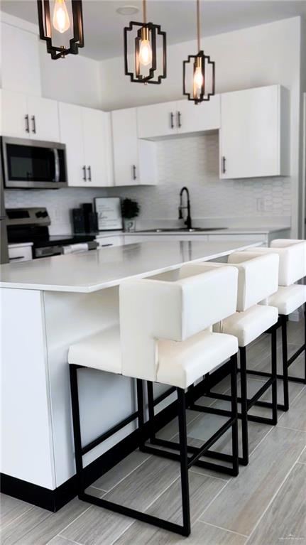 5321 Vision Street Rio Grande City, TX 78582 - Photo 10 of 34 a view of a kitchen with stainless steel appliances granite countertop a sink and a stove