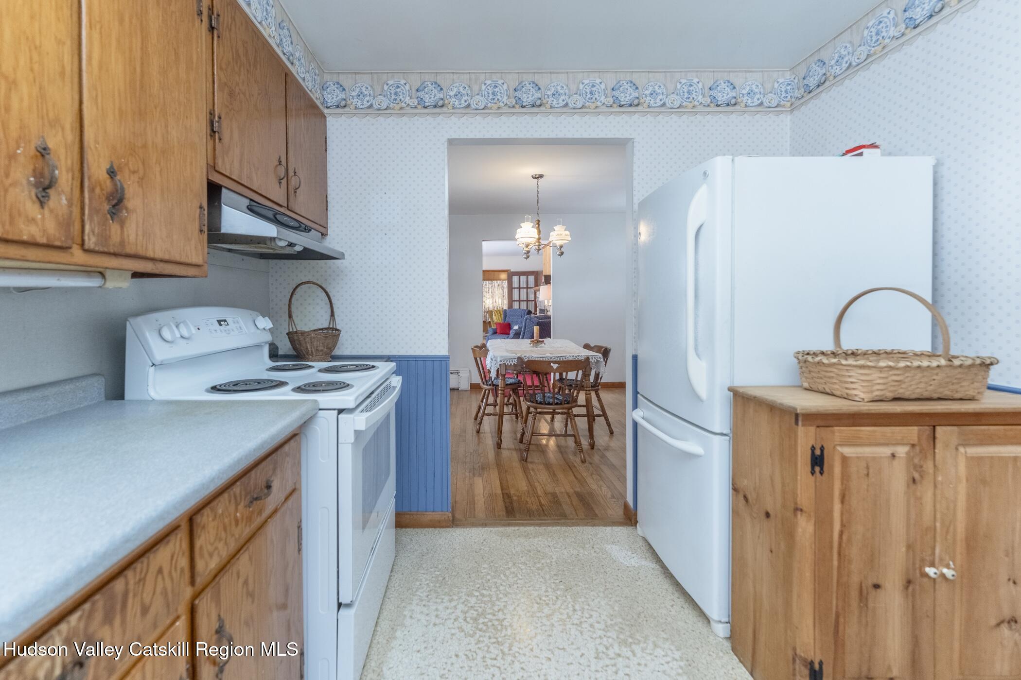232 Cedar Hill Road High Falls, NY 12440 - Photo 13 of 42 a kitchen with a sink a stove and cabinets