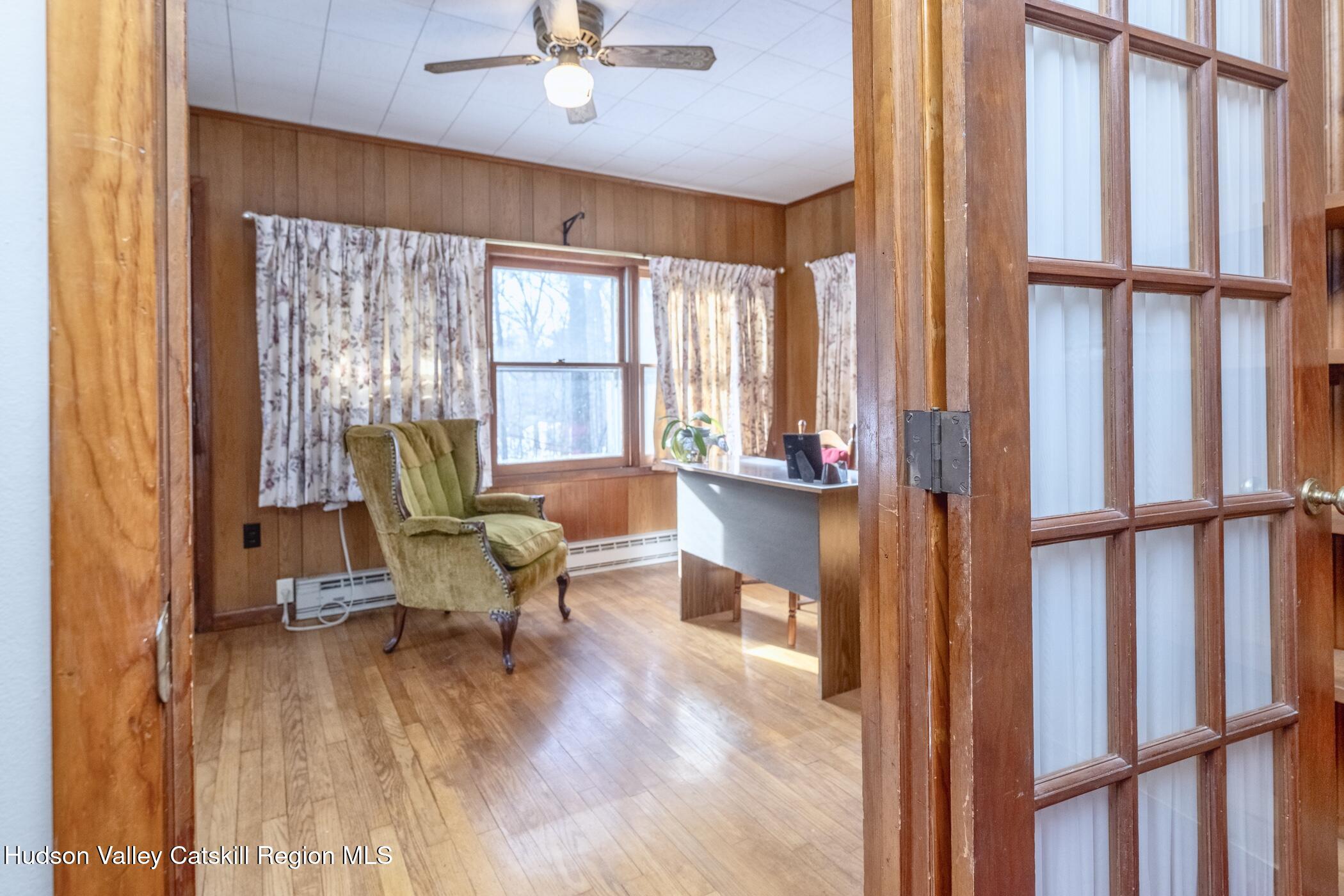 232 Cedar Hill Road High Falls, NY 12440 - Photo 18 of 42 a living room with furniture and a large window