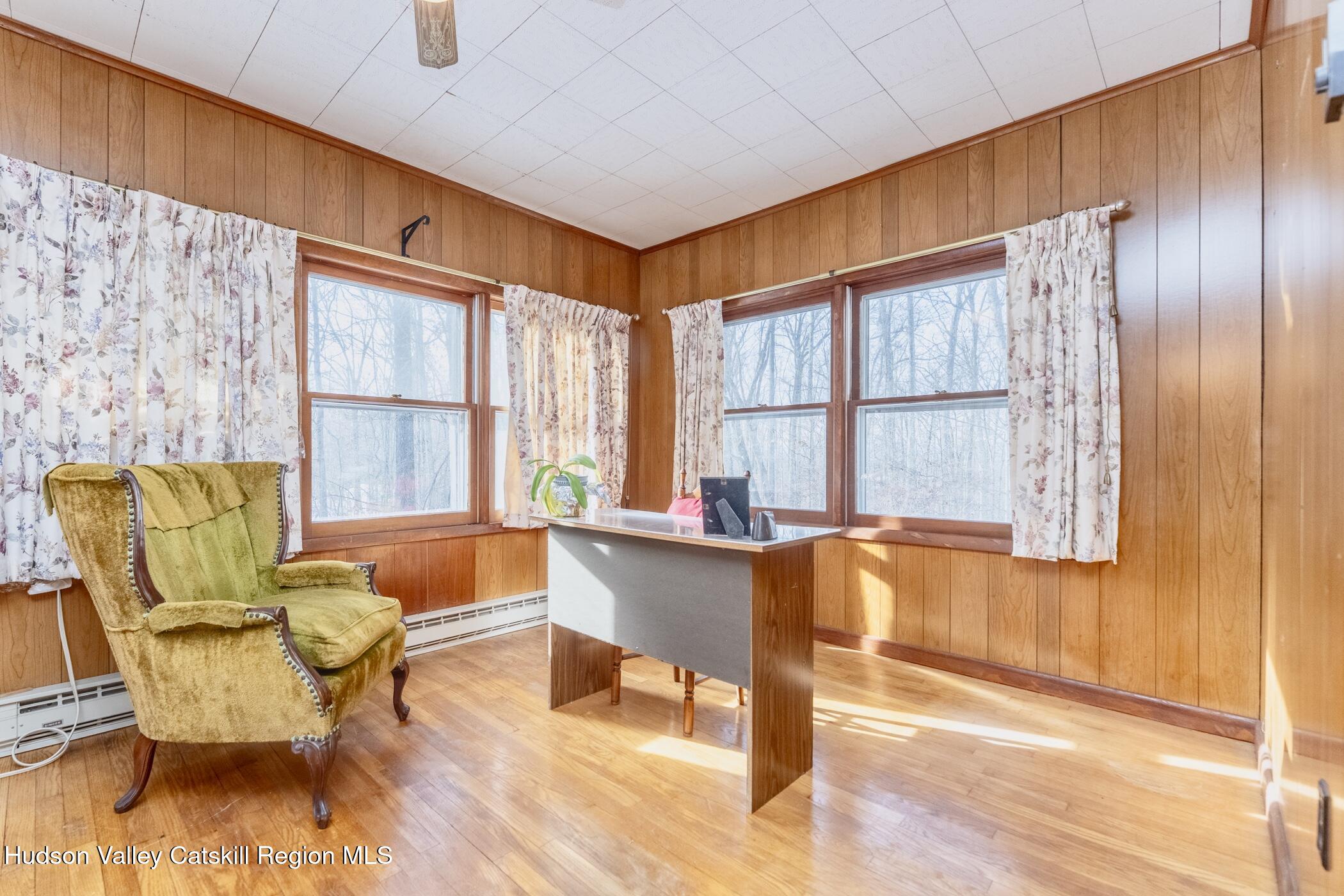 232 Cedar Hill Road High Falls, NY 12440 - Photo 19 of 42 a living room with furniture and a large window