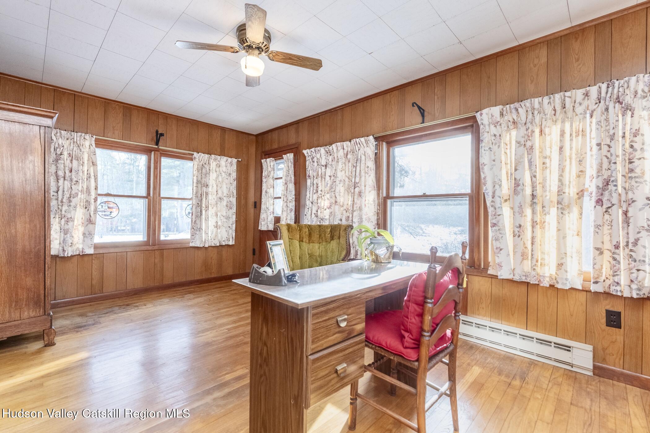232 Cedar Hill Road High Falls, NY 12440 - Photo 20 of 42 a view of a dining room with furniture window and wooden floor