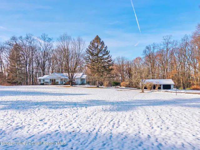 a building with trees in the background