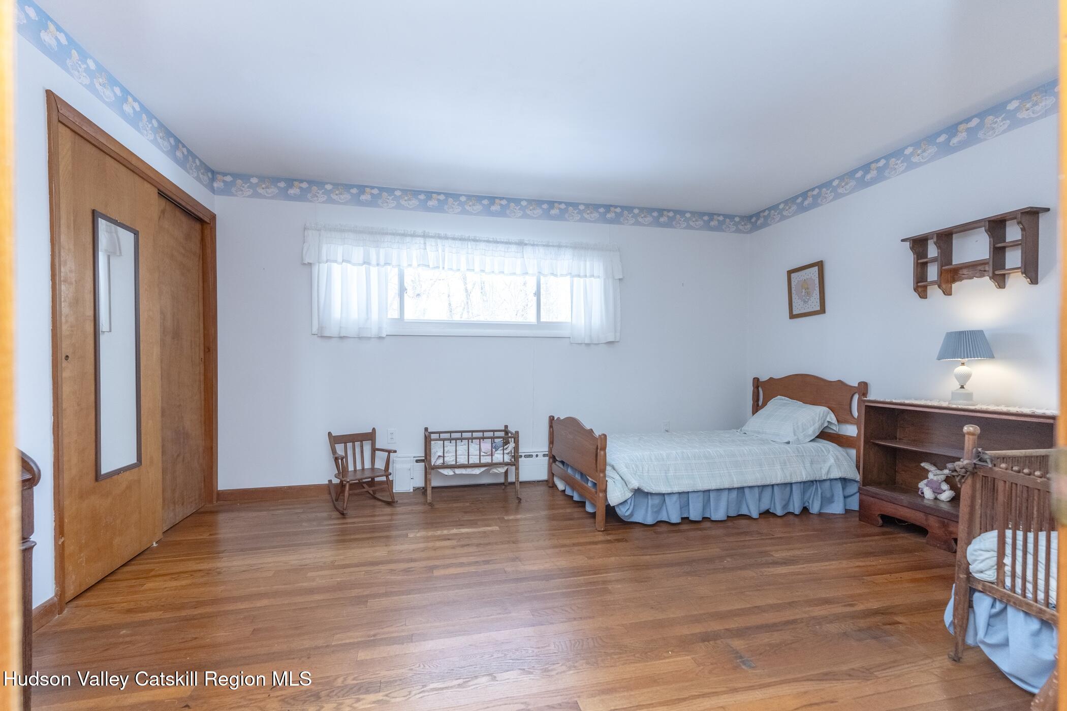 232 Cedar Hill Road High Falls, NY 12440 - Photo 26 of 42 a living room with furniture and a wooden floor